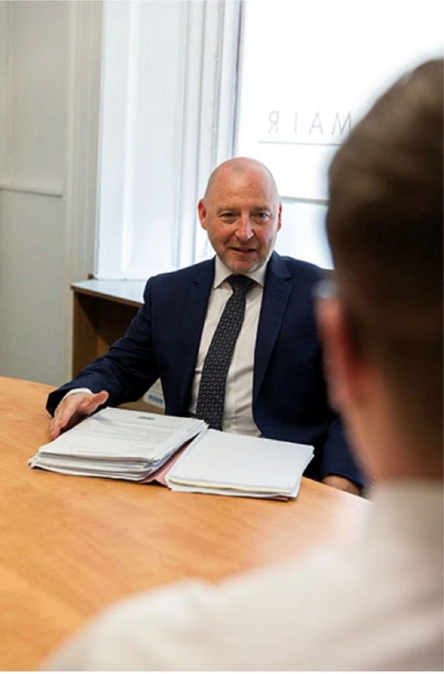 James Black, Director, meeting a client at the Stirling & Mair office in Johnstone